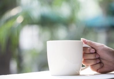 Person Holding Coffee Cup - soothe anxiety