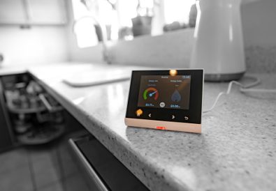 Smart meter fitted in the kitchen of a UK home to enable efficient monitoring of energy usage.